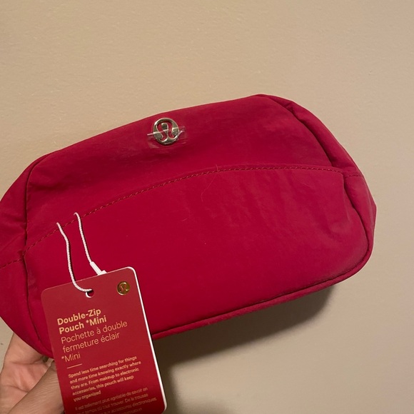 lululemon athletica Handbags - Lululemon Double Pocket Pouch Red NWT